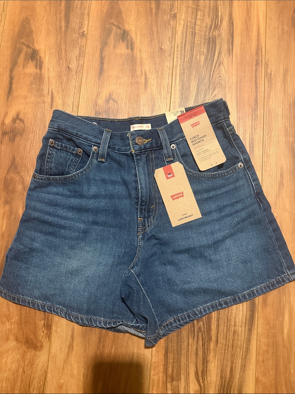 Levi's Dark Blue High-Rise Denim Shorts. Cinch waist. NWT SZ 25